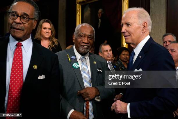 President Joe Biden talks with Rep. Danny Davis and Rep. Emanuel Cleaver after delivering the State of the Union address on February 7, 2023 in the...