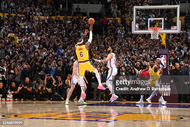 LeBron James of the Los Angeles Lakers shoots the ball to break Kareem Abdul-Jabbar's all time scoring record of 38,388 points during the game...