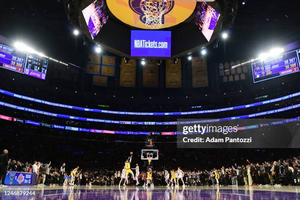 LeBron James of the Los Angeles Lakers shoots the ball to break Kareem Abdul-Jabbar's all time scoring record of 38,388 points during the game...