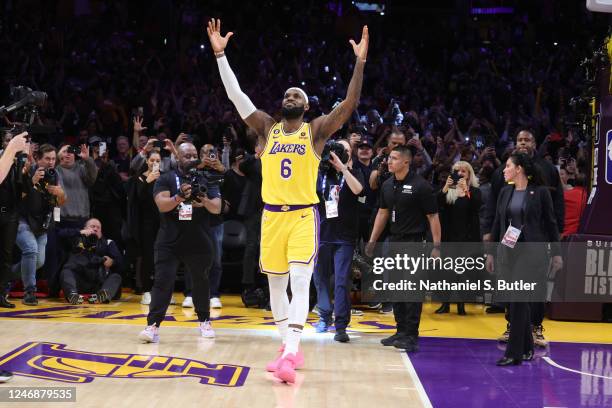 LeBron James of the Los Angeles Lakers celebrates after breaking Kareem Abdul-Jabbars, all time scoring record of 38,387 points during the game...