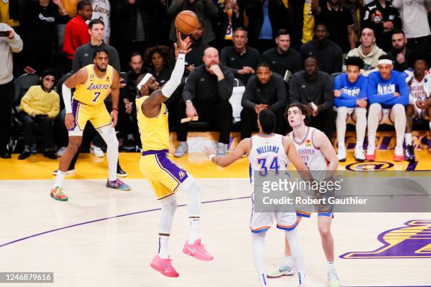 Los Angeles Lakers forward LeBron James shoots to become the all-time NBA scoring leader, passing Kareem Abdul-Jabarr at 38388 points during the...