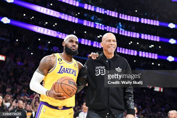LeBron James poses for a photo with Kareem Abdul-Jabbar, after James passes Kareem to become the all-time NBA scoring leader, passing him at 38388...