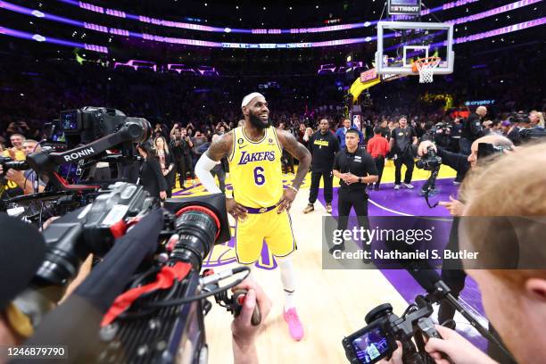 LeBron James of the Los Angeles Lakers celebrates after breaking Kareem Abdul-Jabbars, all time scoring record of 38,387 points during the game...