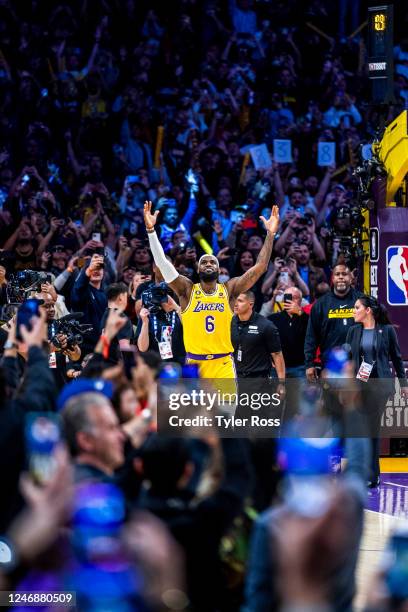 LeBron James of the Los Angeles Lakers celebrates on court after breaking Kareem Abdul-Jabbars all time scoring record of 38,387 points during the...