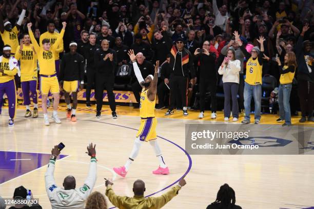 LeBron James of the Los Angeles Lakers celebrates to break Kareem Abdul-Jabbar's all time scoring record of 38,388 points during the game against the...