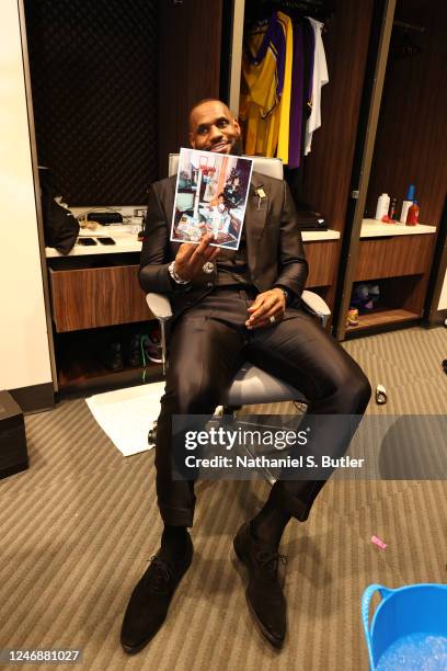 LeBron James of the Los Angeles Lakers celebrates in the locker room after breaking Kareem Abdul-Jabbars, all time scoring record of 38,387 points...