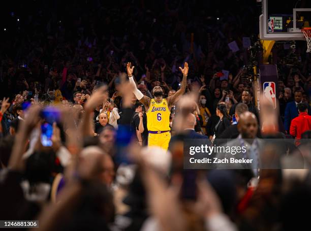 LeBron James of the Los Angeles Lakers celebrates after breaking Kareem Abdul-Jabbars all time scoring record of 38,387 points during the game...