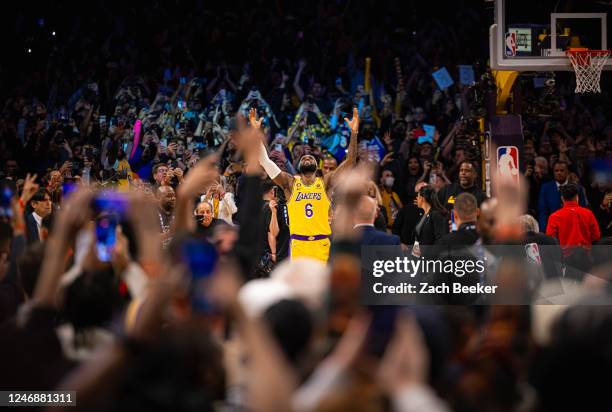 LeBron James of the Los Angeles Lakers celebrates after breaking Kareem Abdul-Jabbars all time scoring record of 38,387 points during the game...