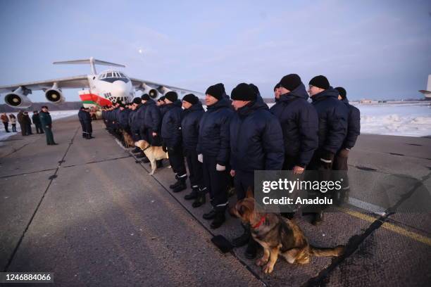 Belarusian rescuers and rescuer dogs are seen ahead of departure of Belarusian rescuer plane from Minsk, Belarus to arrive flew quake-hit regions in...