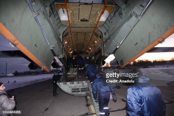 Belarusian rescuers are seen ahead of departure of Belarusian rescuer plane from Minsk, Belarus to arrive flew quake-hit regions in Turkiye to help...