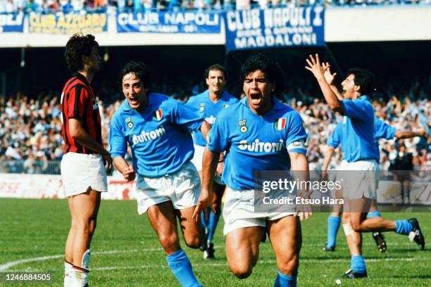 Diego Maradona of Napoli celebrates scoring his side's first goal during the Serie A match between Napoli and AC Milan at the Stadio Pao Paulo on May...