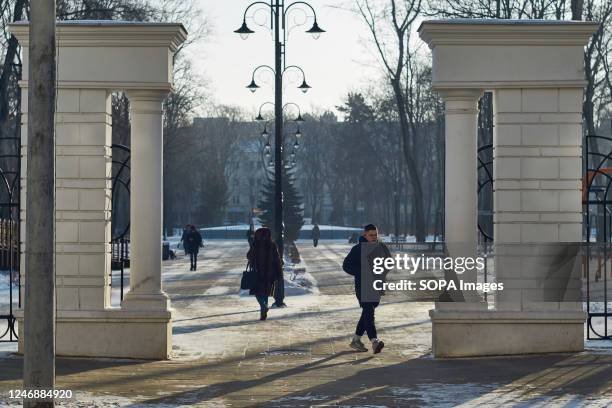 Residents at the entrance to Orlyonok Park on a typical frosty day in Voronezh.