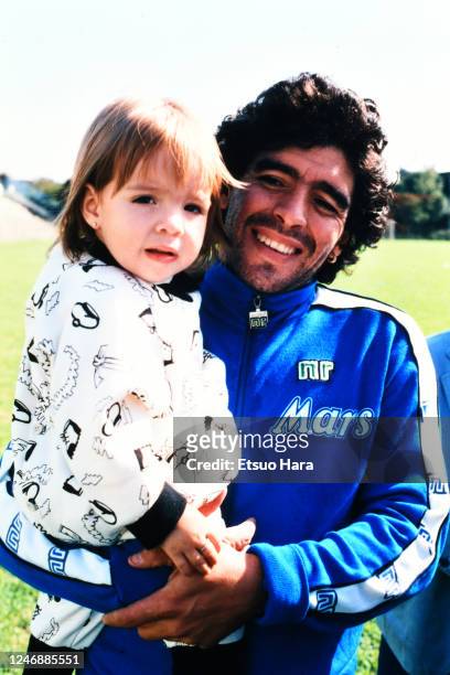 Diego Maradona of Napoli poses with his daughter Dalma after a training at the Centro Paradiso di Soccavo on October 22, 1988 in Naples, Italy.