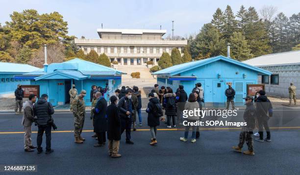 Media members look toward North Korea during a media tour of the truce village of Panmunjom in the Joint Security Area of the Demilitarized Zone...