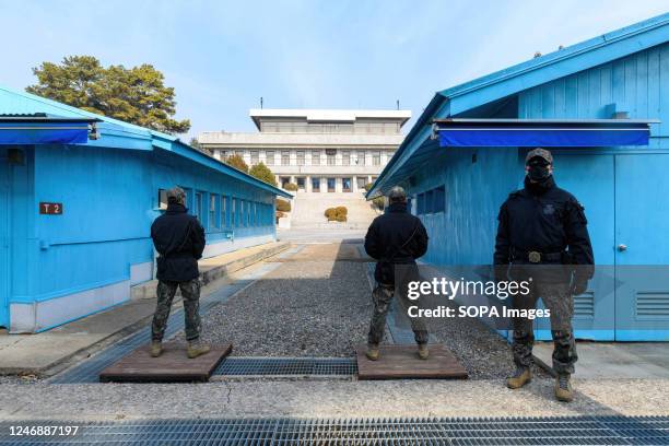 South Korean soldiers stand guard during a media tour at the truce village of Panmunjom in the Joint Security Area of the Demilitarized Zone...