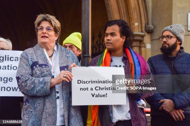 Protesters hold a placard which states 'Discrimination is not a Christian value' during the demonstration. Protesters gathered outside the Church of...