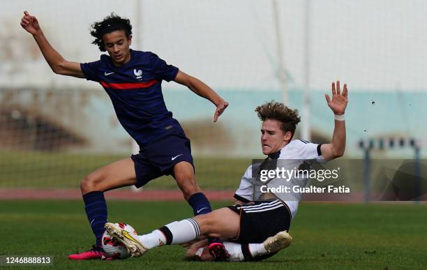 Ben Weber of Germany with Ayyoub Bouaddi of France in action during the International Friendly match between U16 France and U16 Germany at Estadio...