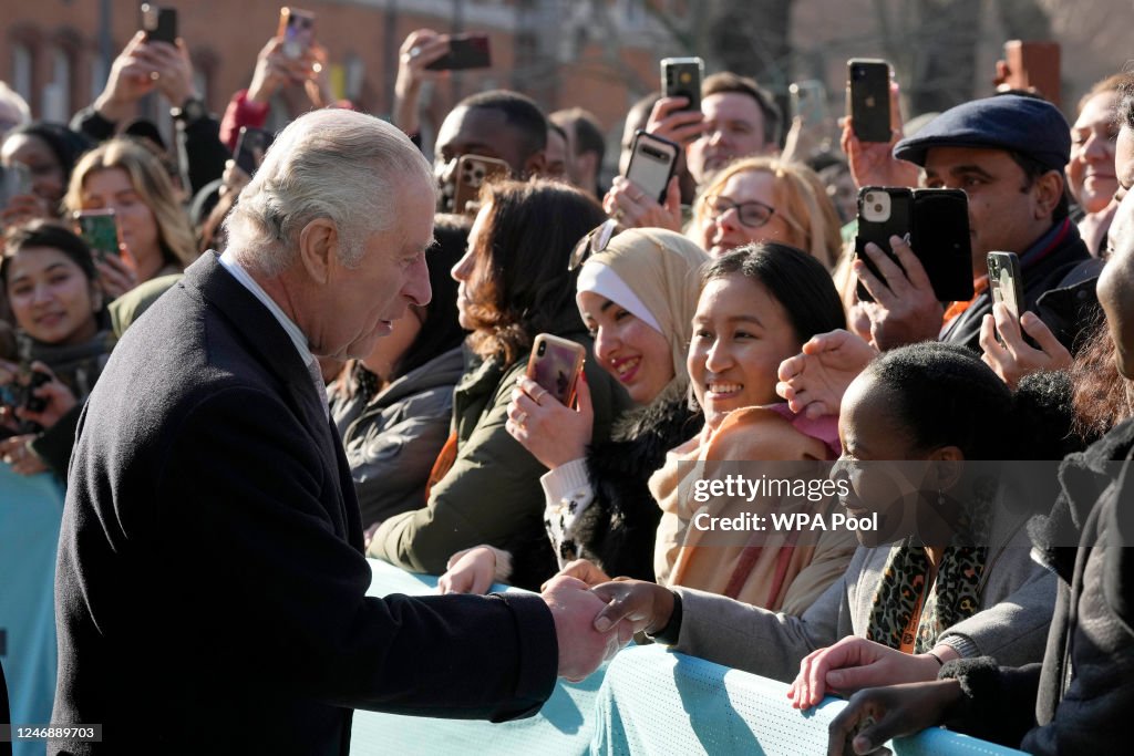britains-king-charles-iii-shakes-hands-with-students-as-he-visits-the-university-of-east.jpg