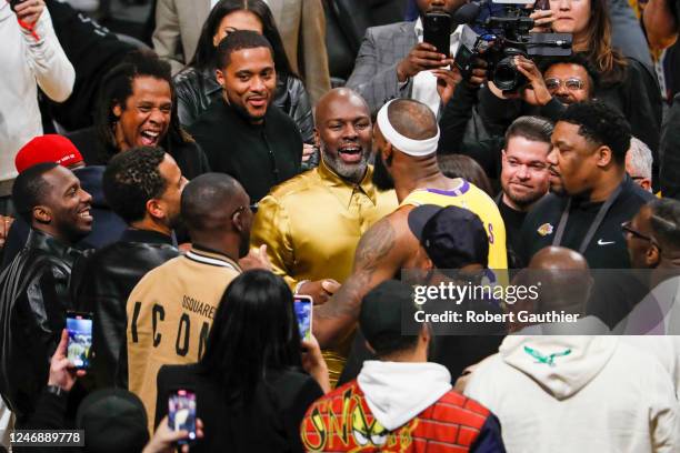 Los Angeles, CA, Tuesday, February7, 2023 - LeBron James greets famous fans, including JayZee, left after attaining the NBA scoring title during a...