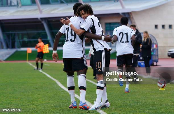 Ken Izekor of Germany celebrates with teammate Kilian Sauck of Germany after scoring a goal during the International Friendly match between U16...