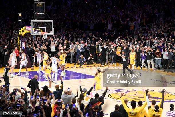 LeBron James celebrates after making a shot to become the all-time NBA scoring leader, passing Kareem Abdul-Jabbar at 38388 points during the third...