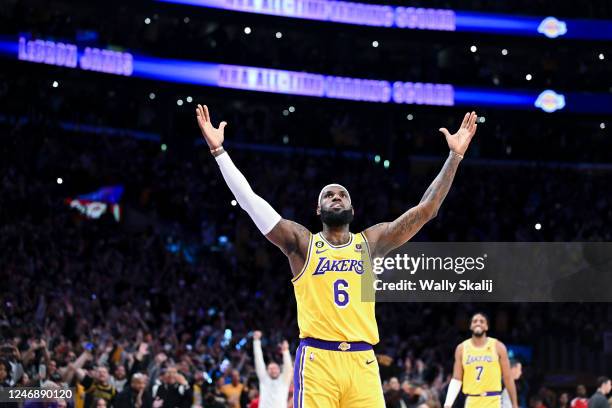 LeBron James celebrates after a shot to become the all-time NBA scoring leader, passing Kareem Abdul-Jabbar at 38388 points during the third quarter...