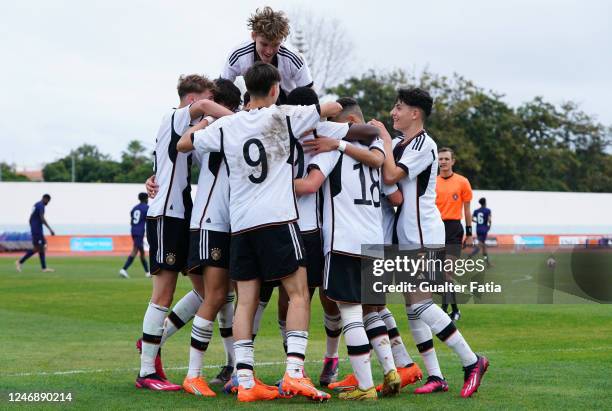 Ken Izekor of Germany celebrates with teammates after scoring a goal during the International Friendly match between U16 France and U16 Germany at...