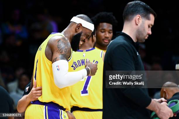 Los Angeles Lakers forward LeBron James grimaces after being injured during the first quarter against the Oklahoma City Thunder at Crypto.com Arena...