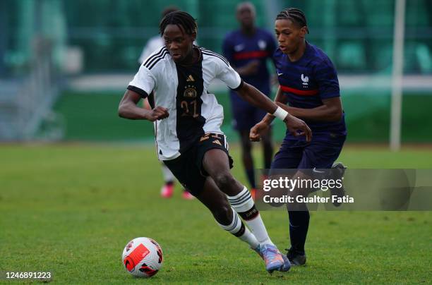 Trevor Benedict of Germany with Nathan Talbot of France in action during the International Friendly match between U16 France and U16 Germany at...