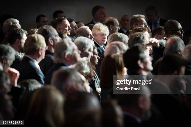 Former prime minister Boris Johnson in the audience listening to Ukrainian President Volodymyr Zelensky as he addresses parliamentarians in...