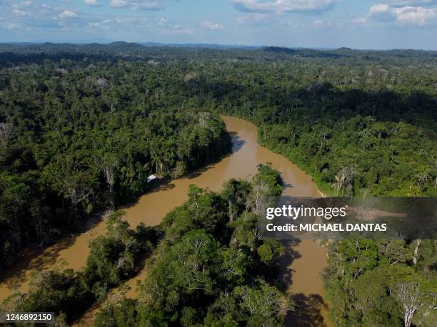 Aerial view of Porto do Arame, located on the banks of the Uraricoera river, which is the main access point for people trying to leave illegal mining...