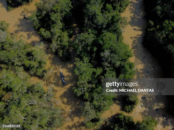 Aerial view of Porto do Arame, located on the banks of the Uraricoera river, which is the main access point for people trying to leave illegal mining...