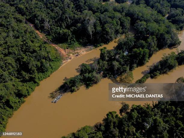 Aerial view of Porto do Arame, located on the banks of the Uraricoera river, which is the main access point for people trying to leave illegal mining...