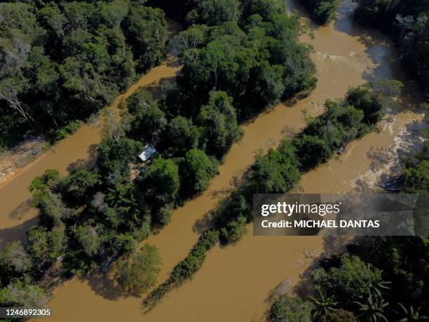 Aerial view of Porto do Arame, located on the banks of the Uraricoera river, which is the main access point for people trying to leave illegal mining...