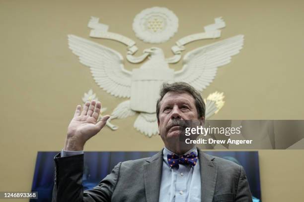 Commissioner of the Food and Drug Administration Robert Califf is sworn-in during a House Energy and Commerce Subcommittee on Oversight and...
