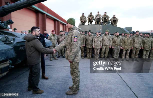 Prime Minister Rishi Sunak and Ukrainian President Volodymyr Zelensky visit a a military facility to meet Ukrainian troops being trained to command...