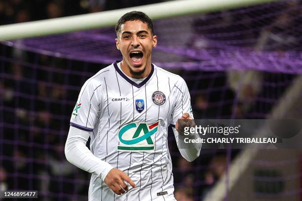 Toulouse's French midfielder Fares Chaibi celebrates scoring his team's third goal during the French Cup round of 16 football match between Toulouse...