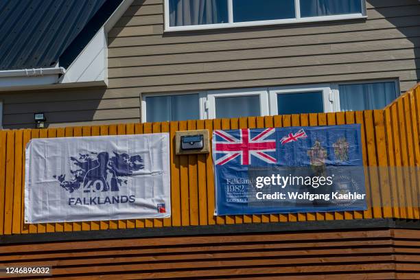 Street scene with flags in Port Stanley commemorating the 40-year anniversary of the Falkland Island war in 1982.