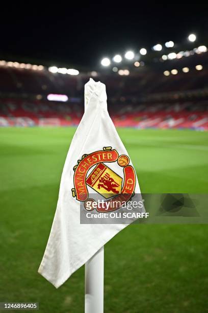 Manchester United flag is pictured on the corner of the pitch prior to the start of the English Premier League football match between Manchester...
