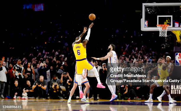 Los Angeles, CA LeBron James of the Los Angeles Lakers shoots his record breaking shot as he breaks Hall of Fame and former Los Angeles Lakers Kareem...