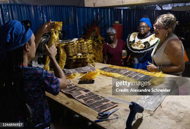 Members of Perola Negra samba school works on costumes at Perola Negra "quadra" headquarters on January 31, 2023 in Sao Paulo, Brazil. After being...