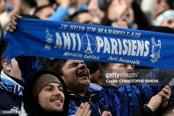 Marseille's fan holds a banner prior to the French Cup round of 16 football match between Olympique Marseille and Paris Saint-Germain at Stade...