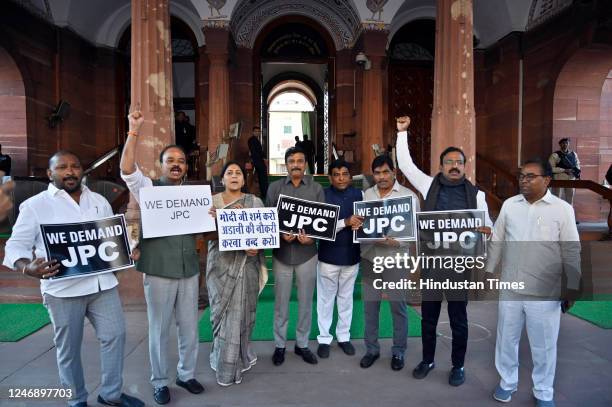 MPs of BRS stage a protest demanding joint parliamentary committee probe into Adani row following Hindenburg's report during Budget Session of...