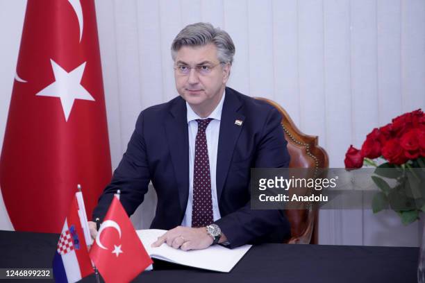Croatian Prime Minister Andrej Plenkovic signs condolence book to express his condolences and solidarity messages for Turkiye after 7.7 and 7.6...