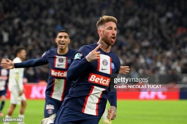 Paris Saint-Germain's Spanish defender Sergio Ramos celebrates scoring his team's first goal during the French Cup round of 16 football match between...