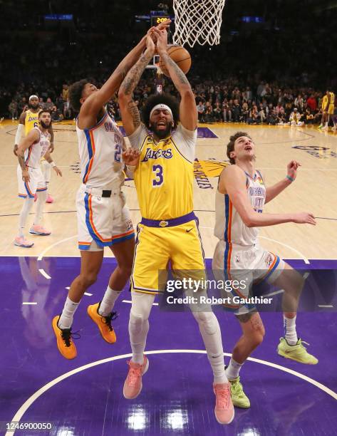 Los Angeles, CA, Tuesday, February7, 2023 - Oklahoma City Thunder guard Aaron Wiggins knocks the ball from Los Angeles Lakers forward Anthony Davis...