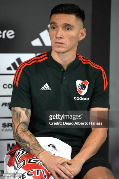 New signing Matias Kranevitter of River Plate holds his jersey during a press conference to unveil new signings at River Camp on February 8, 2023 in...