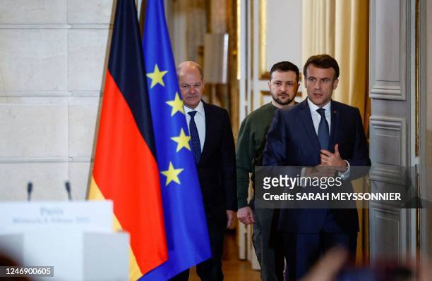 France's President Emmanuel Macron , Ukraine's President Volodymyr Zelensky and Germany's Chancellor Olaf Scholz arrive for a joint press conference...
