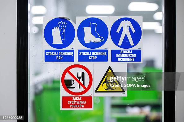 Health and safety signs are seen at the modernized waste sorting ...