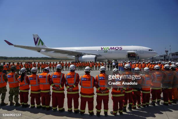 Humanitarian support rescuers from El Salvador prepare to board a plane to Turkiye after two powerful earthquakes, at the Comalapa international...